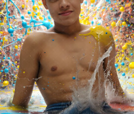 AI-generated abstract art of handsome men controlling swirling vortexes of colorful fluid and water in motion. Dynamic, surreal, vivid digital male art by Jeff Dupler.