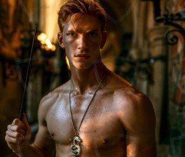 AI-generated wizards of the serpent house handsome shirtless mages of the wizard academy conjuring demonic snakes in dark cinematic UHD fantasy art.