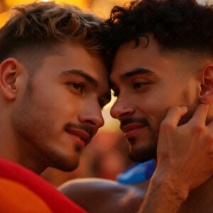 AI-generated Pride celebration art handsome men at vibrant LGBTQ+ Pride parades, embellished with rainbow colors, walking with pride, and celebrating love. By Jeff Dupler.