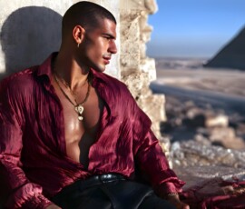 AI-generated portraits of a handsome young Egyptian man at the Pyramids of Giza, the Great Sphinx, and on the Nile in golden-hour light. Cinematic UHD.